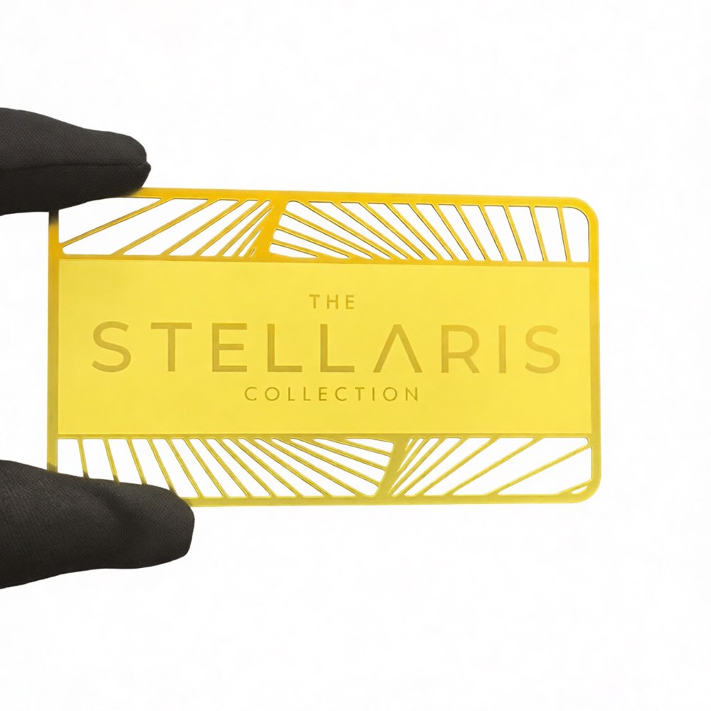 Premium metal card from THE STELLARIS COLLECTION, luxury stainless steel or brass construction with elegant laser engraving, RFID/NFC technology for VIP membership and exclusive access