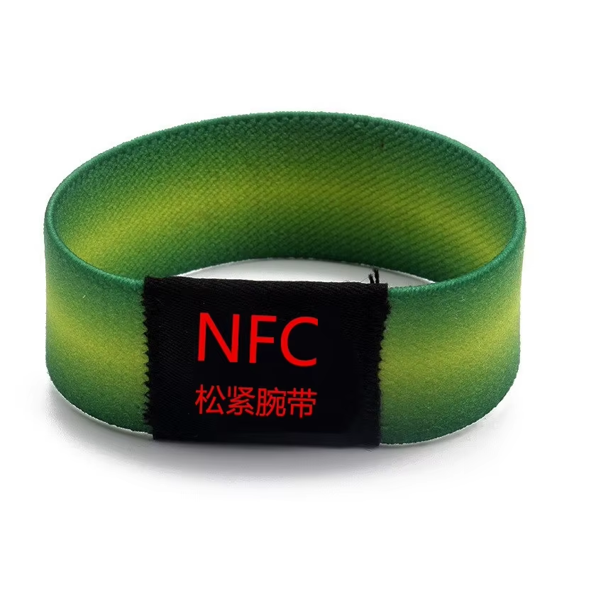 Custom RFID NFC elastic smart wristband with stretchy fabric construction, waterproof coating, adjustable fit for all wrist sizes, embedded 13.56MHz chip with NFC technology for access control and cashless payments at events and festivals