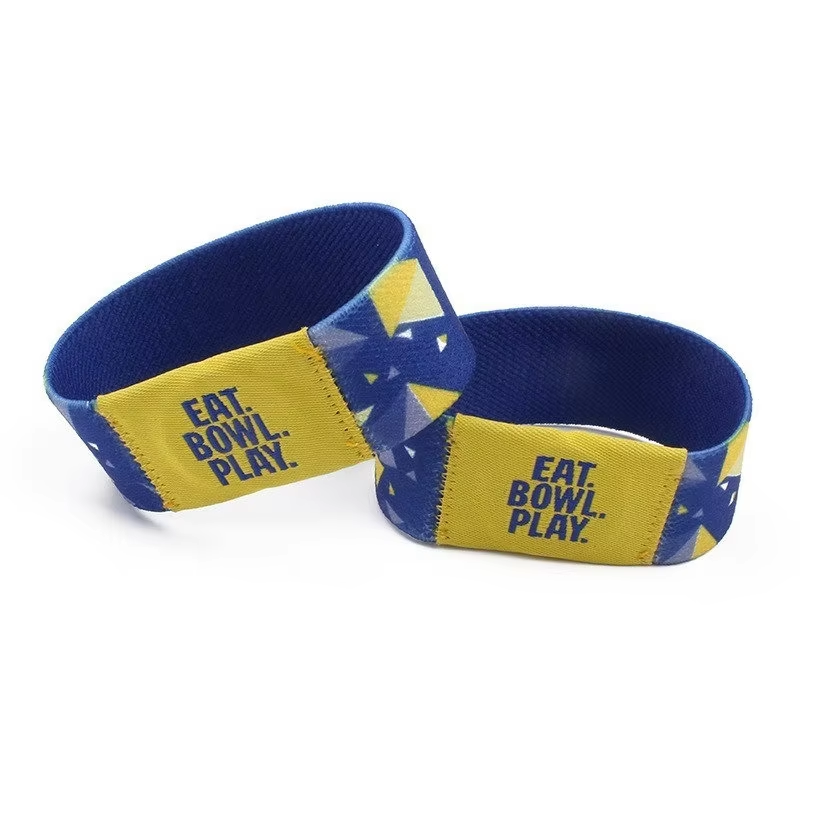 Custom RFID NFC elastic smart wristband with colorful design and "EAT BOWL PLAY!" text, stretchy fabric construction, waterproof coating, embedded 13.56MHz chip for event access control and cashless payments at festivals and entertainment venues