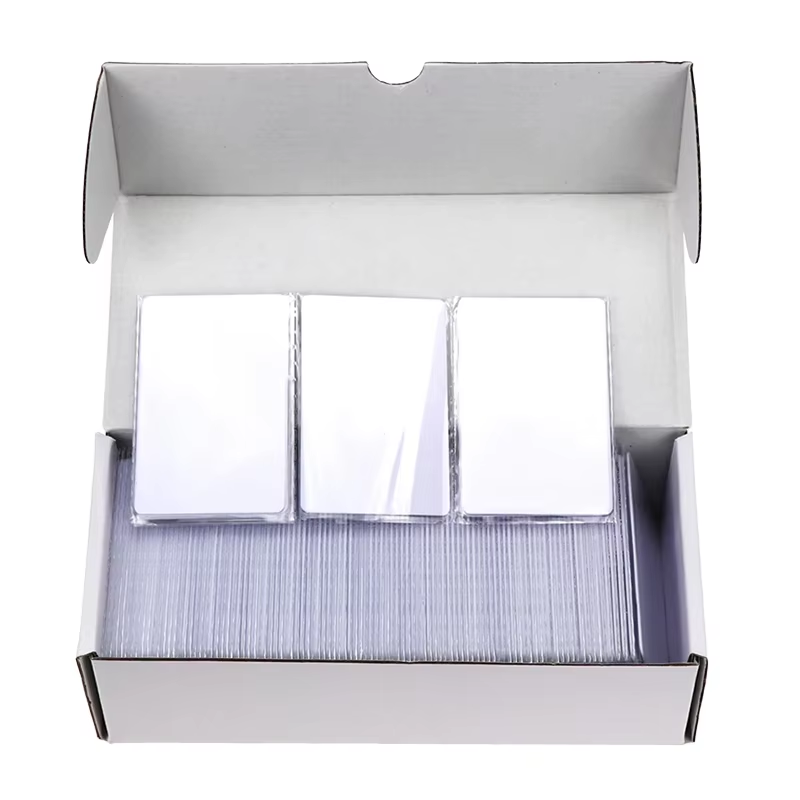 Stack of blank white PVC cards showing side profile, demonstrating uniform 0.76mm thickness and perfect flatness for printer feeding