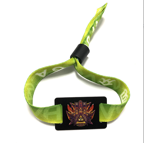 RFID NFC woven wristband with adjustable slider, durable polyester fabric construction, waterproof design with custom color printing, embedded 13.56MHz chip for event access control and cashless payments